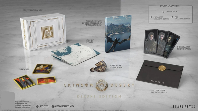 Deluxe edition of 'Crimson Desert' game collection with packaging, cards, and merchandise on a gray surface.